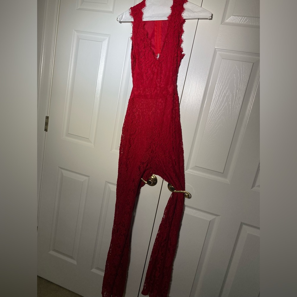 Red backless lace jumpsuit. Worn only for photo shoot